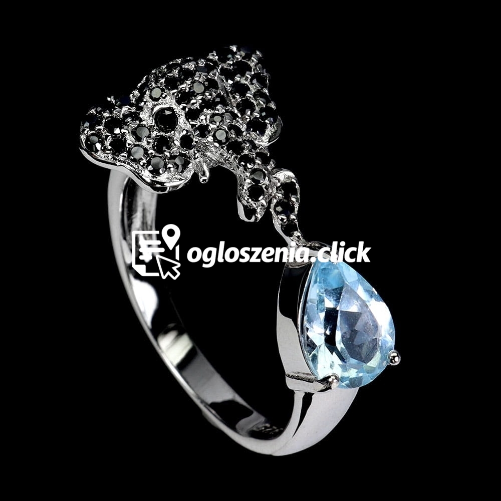 Zdjęcie produktu Srebrny delikatny pierscionek r 14 naturalny sky topaz czarne spinele slon